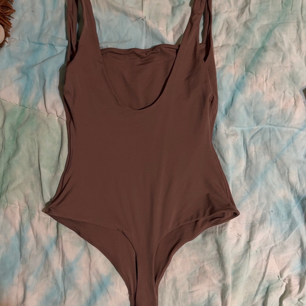 brown bodysuit